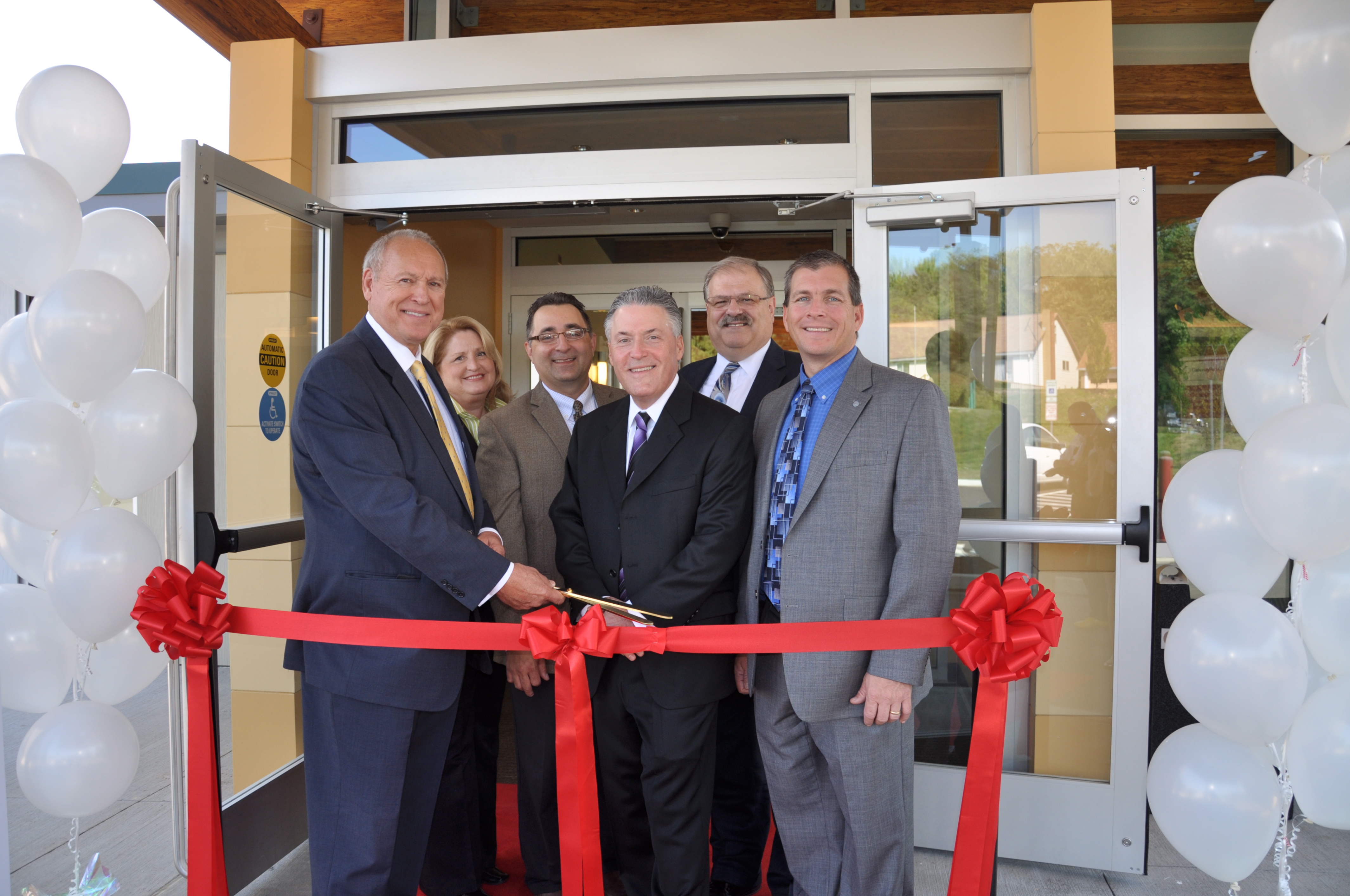 Executives cut the ribbon at the new Youth Services Center in Center Township, PA